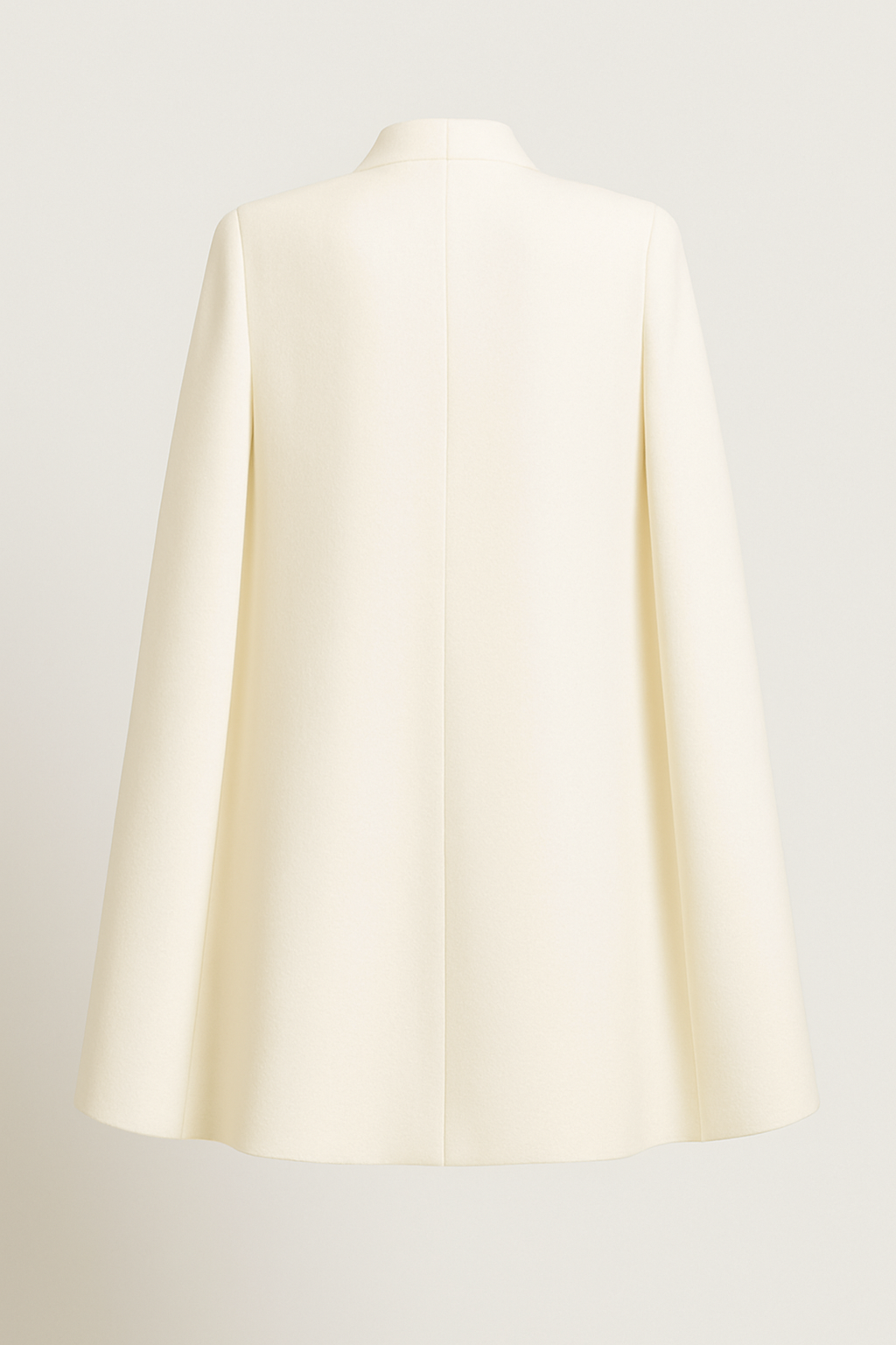 White Cape Dress with Deep V-Neckline and Statement Button