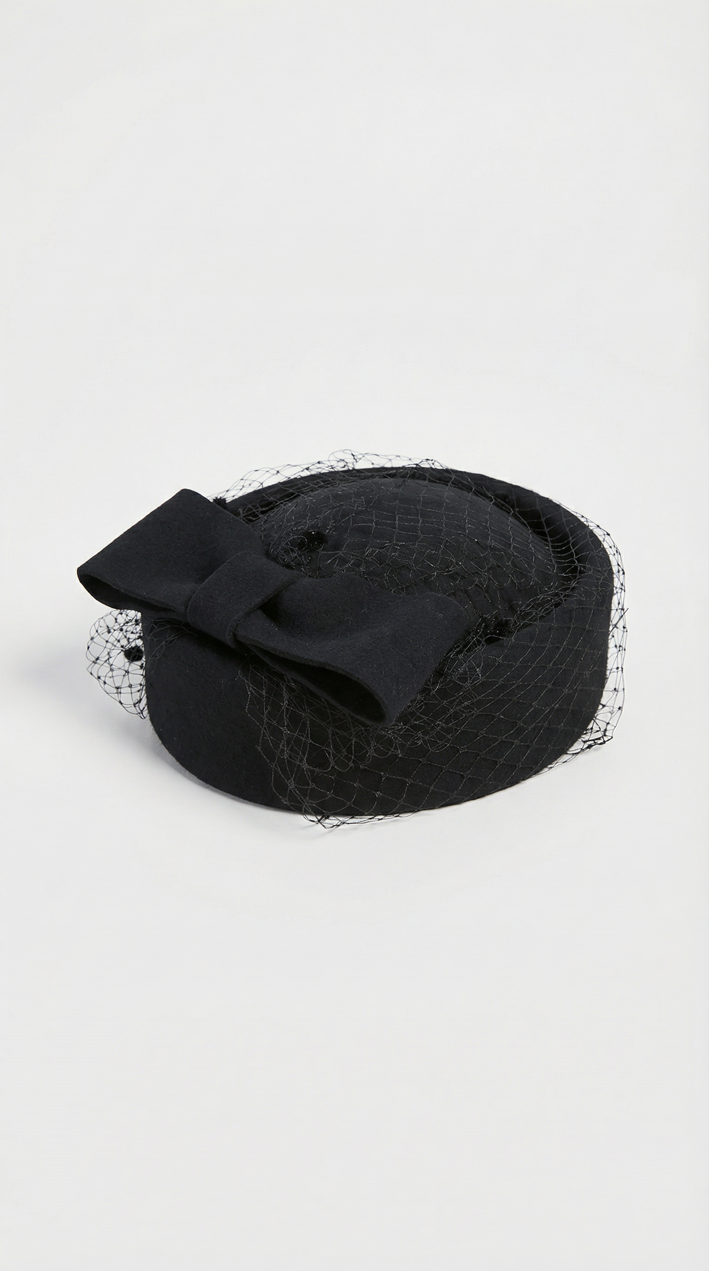 Elegant Black Wool Beret with Large Bow and Veil Detail